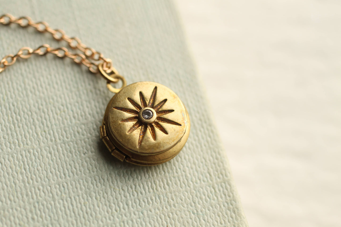 compass locket in brass