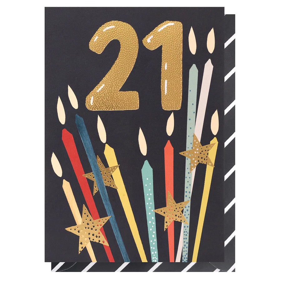 Card with '21' in gold and colorful candles on a black background