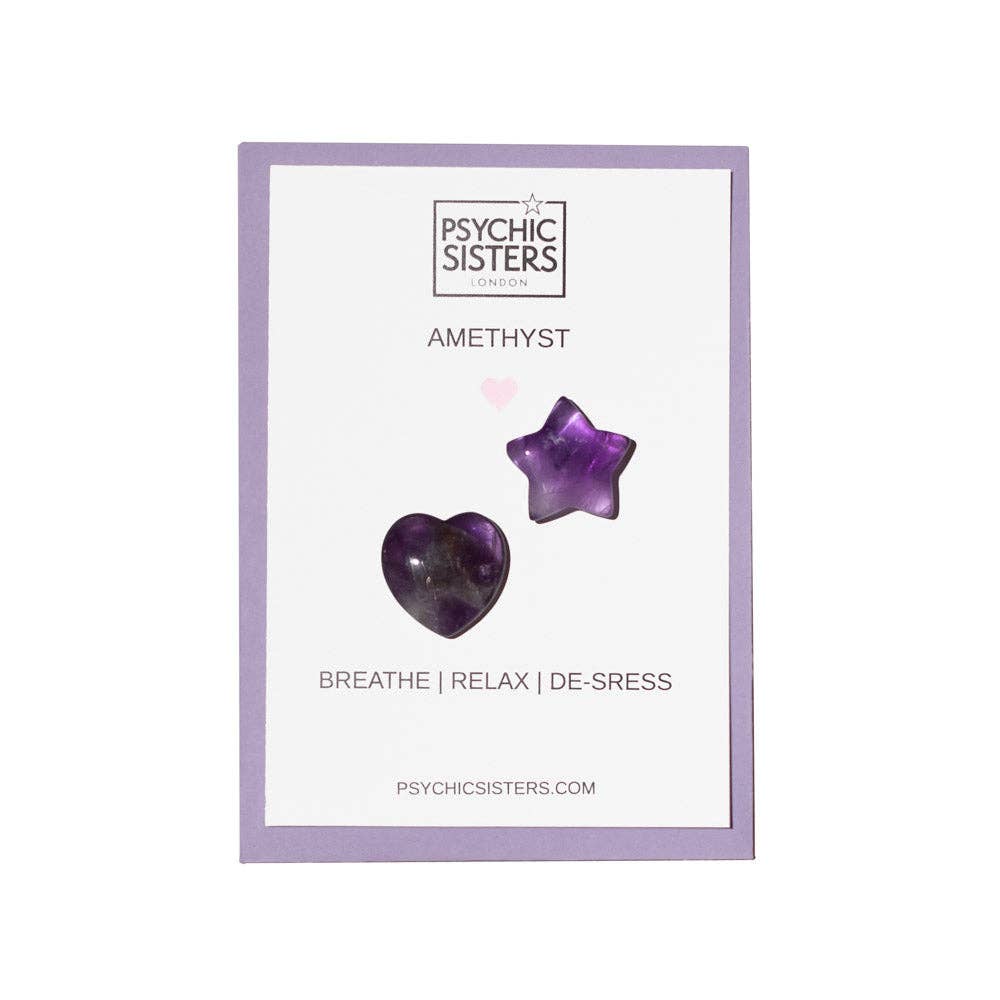Amethyst crystal heart and star shapes, mounted on a white card with a lavender border. The card features the Psychic Sisters London logo and text reading 'AMETHYST BREATHE | RELAX | DE-SRESS'.