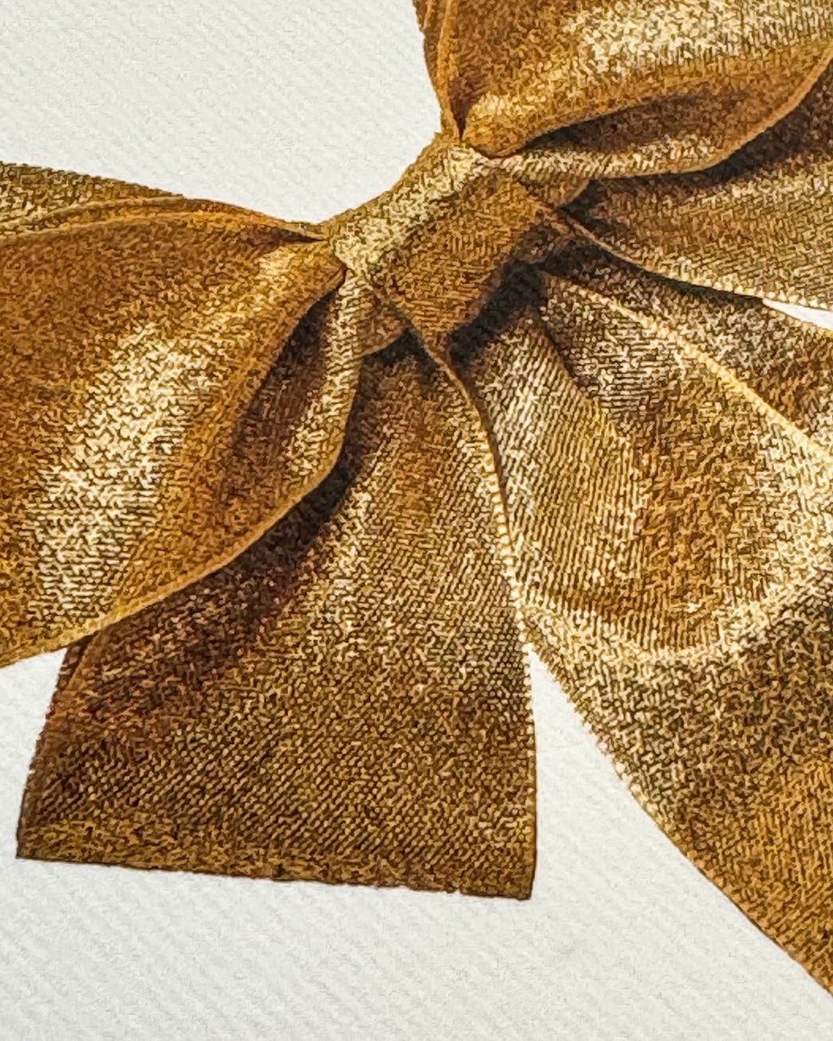 Greetings Card with a Gold Ribbon looking bow on the front. Looks like real material but it is an image White Background. White Envelope.