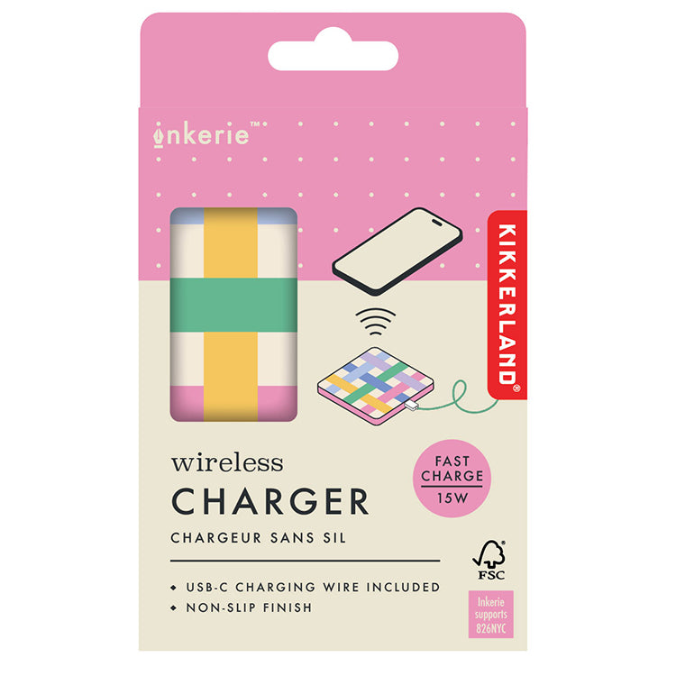 Kikkerland wireless charger packaging with colorful design on a pink background