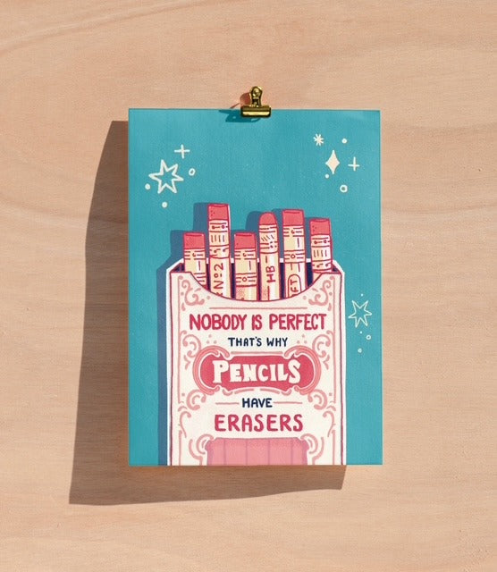 a5 print with a hand drawn box of pencils and written on the box is Nobody is perfect that's why pencils have erasers. the background colour is turquoise.