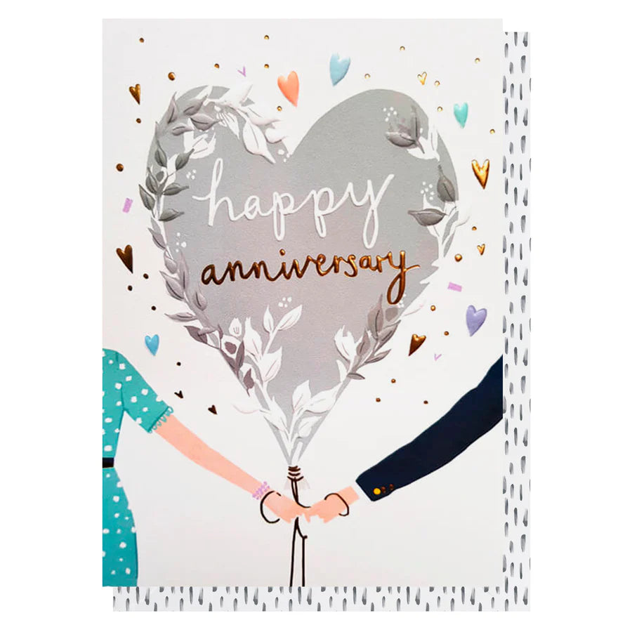 Greeting card with two hands holding a heart-shaped balloon with 'happy anniversary' text.