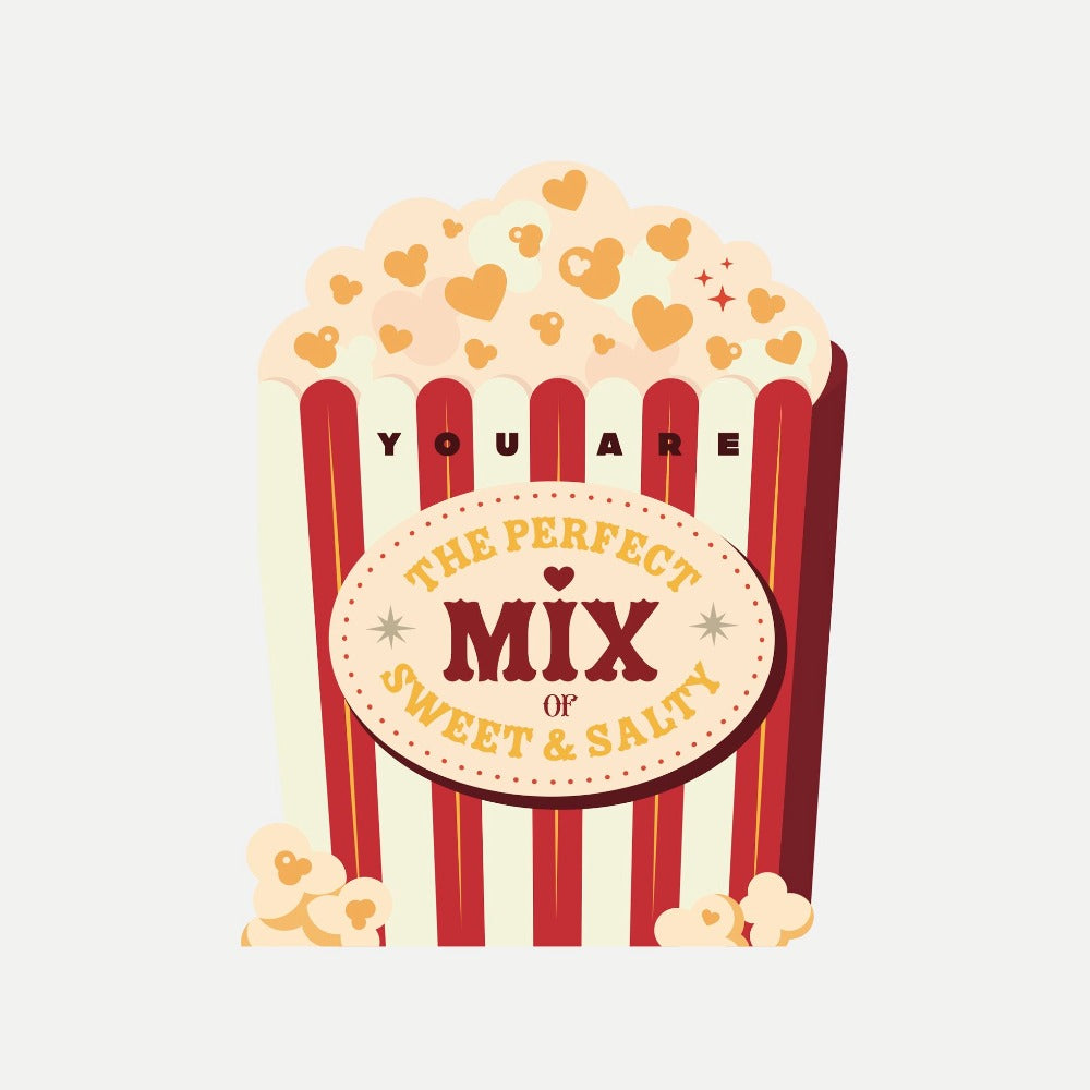 Popcorn box with text 'You are the perfect mix of sweet & salty' on a light beige background