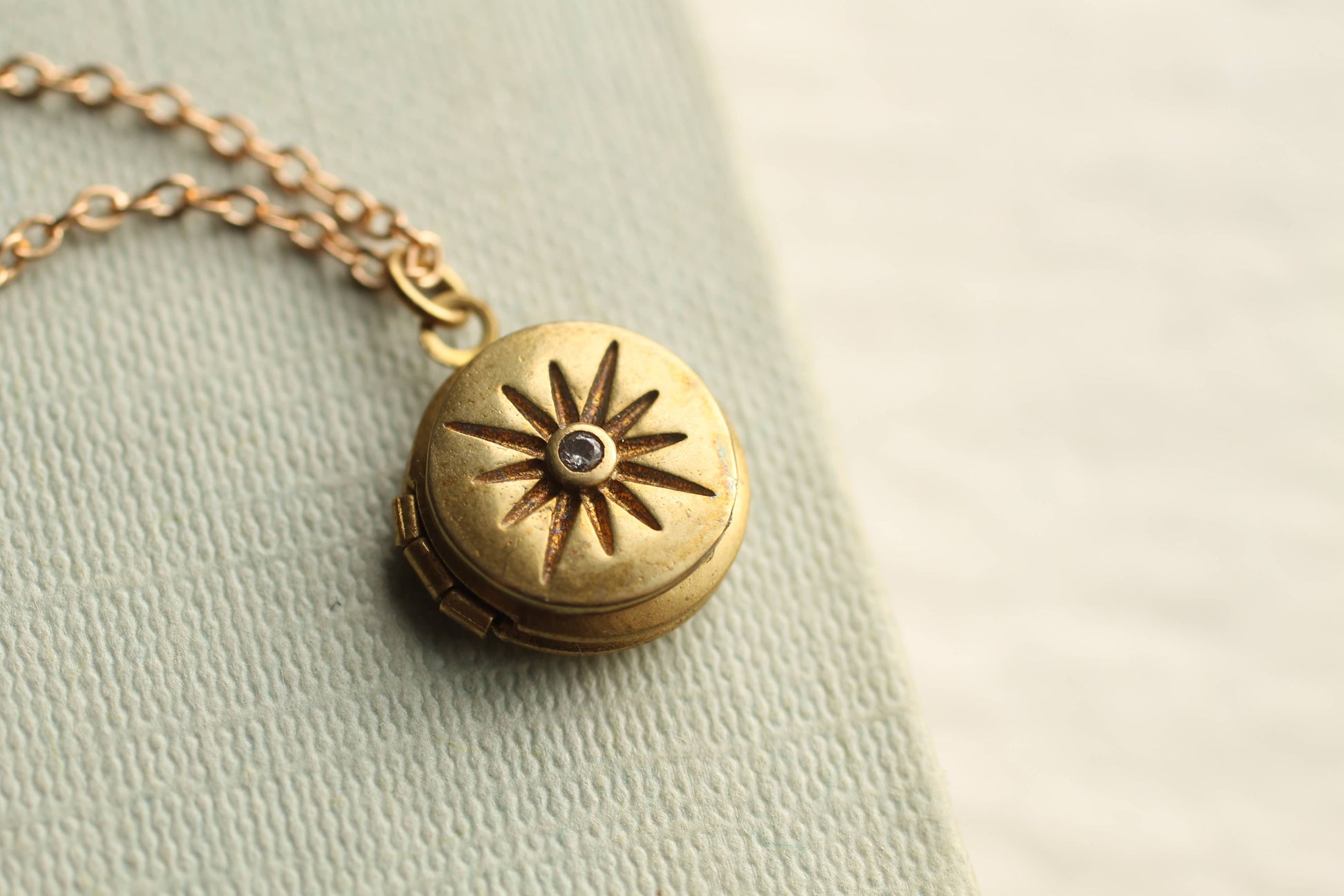 compass locket in brass 