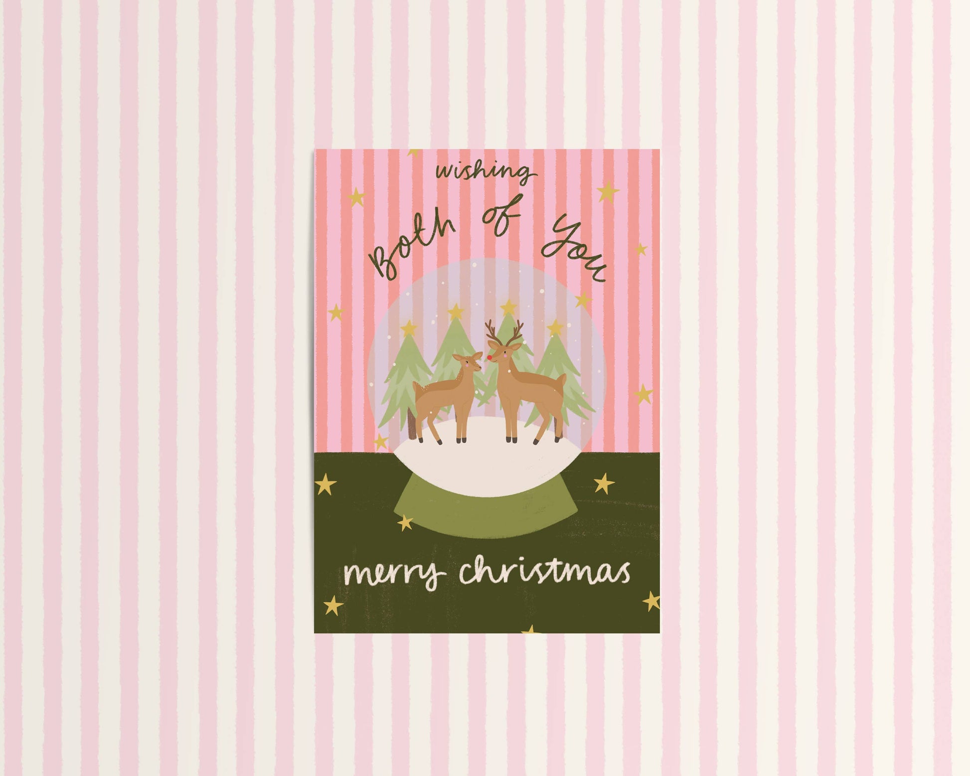 Christmas card with reindeer and trees on a pink and white striped background
