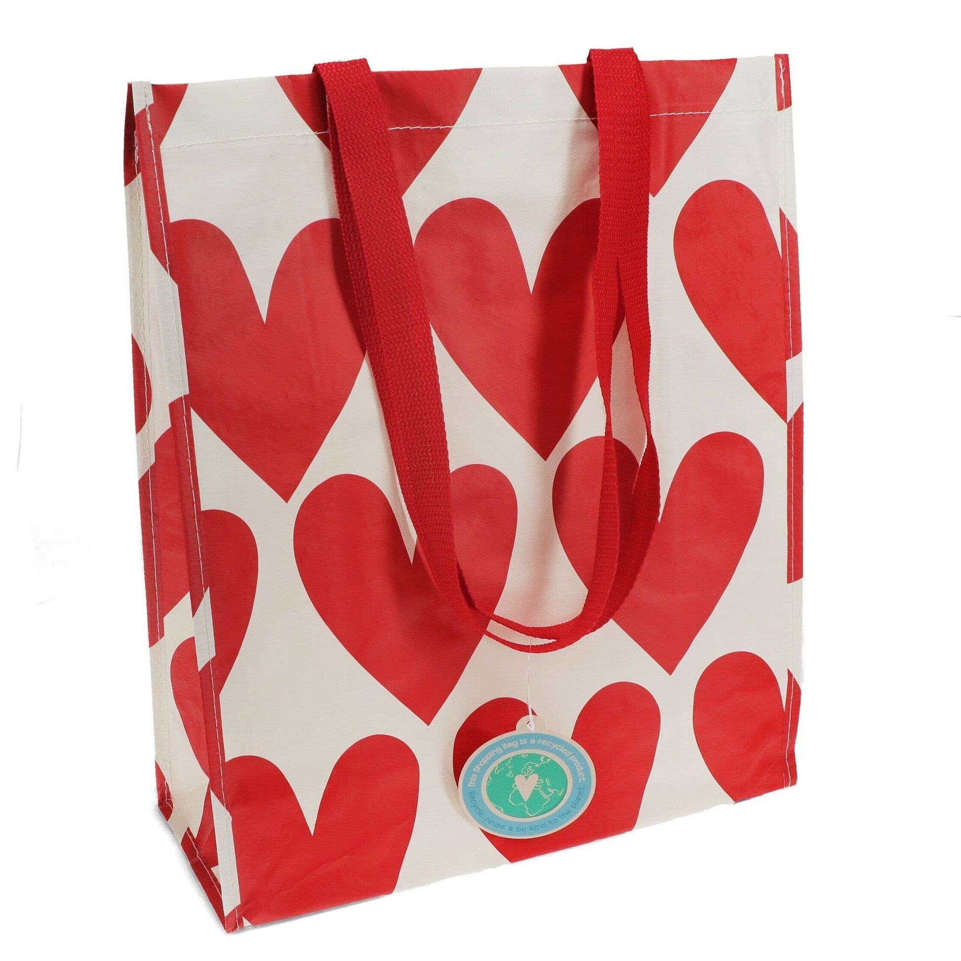 Shopping Bag with white background and red hearts with red handles