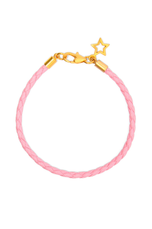 Pink braided bracelet with gold clasp on a white background