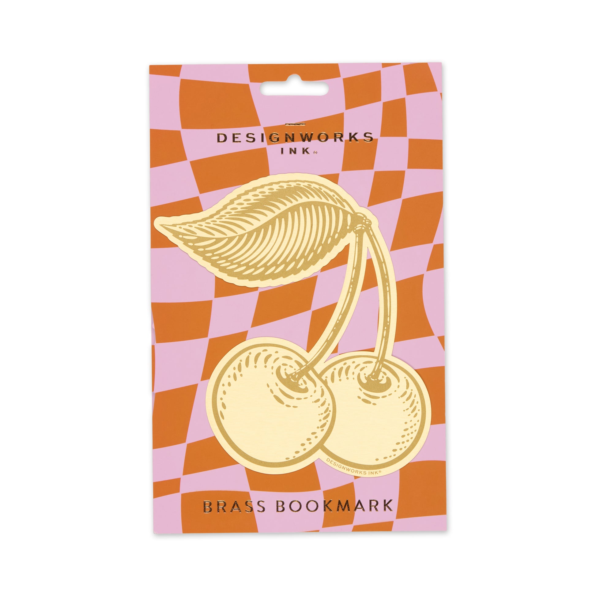 Brass bookmark packaging with a checkered pattern and 'Designworks Ink' branding.