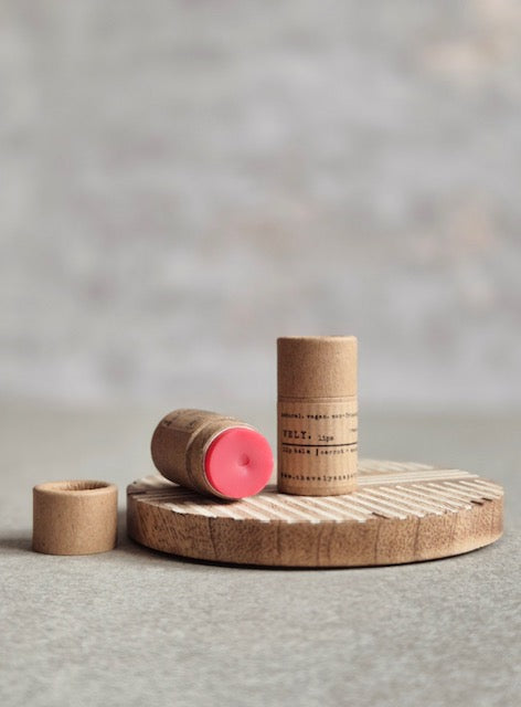 Mini natural lip balm a blend of plant-based waxes, oils, and butters, providing a pure and nourishing lip care experience. Lightly tinted with mica, a 100% natural mineral, it adds a delicate hint of colour to your daily routine. Vegan friendly in a cardboard push up tube.