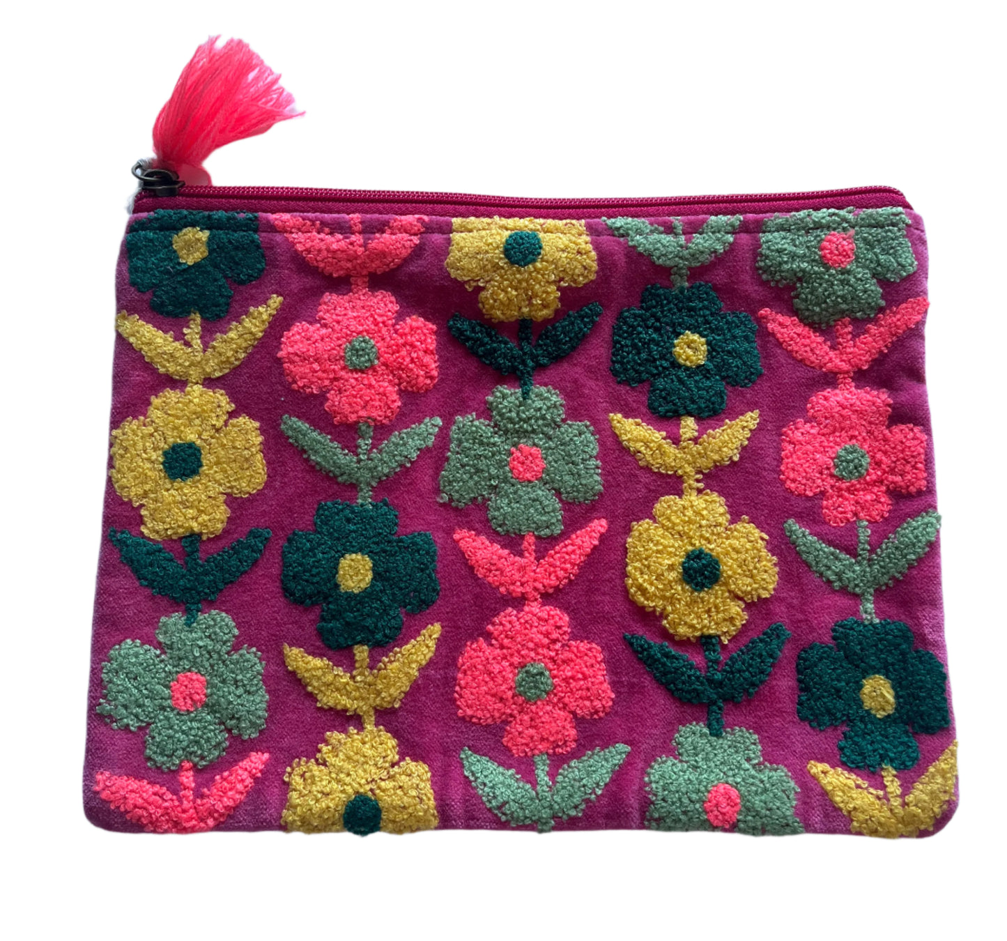 Floral patterned pouch with colorful flowers on a pink background