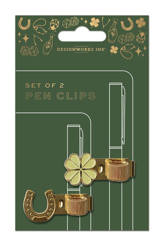 Set of 2 pen clips with a horseshoe on one clip and a clover design on the other