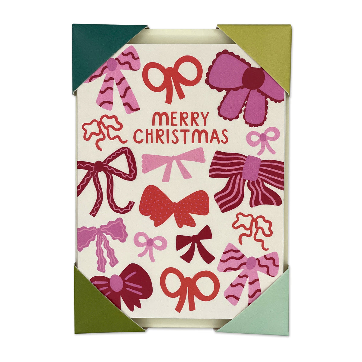 A Christmas greeting card featuring a festive pattern of various bow illustrations in shades of red, pink, and purple on an off-white background, with 'MERRY CHRISTMAS' written in the center. The card is shown with its green and gold triangular corner tabs folded out against a plain white background.