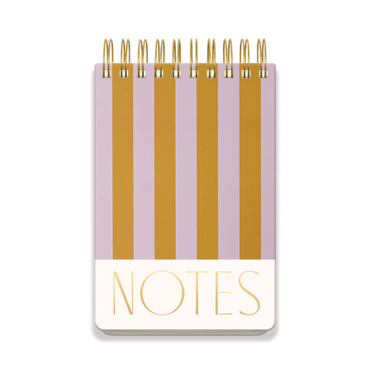 Small notebook with gold and purple striped design on a white background