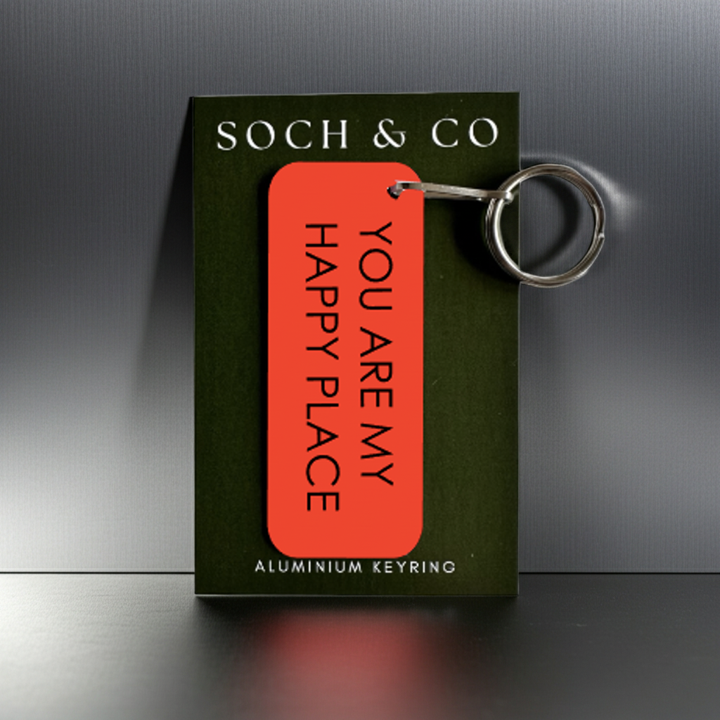 Keyring with a red tag on a black box, featuring 'SOCH & CO' branding.
