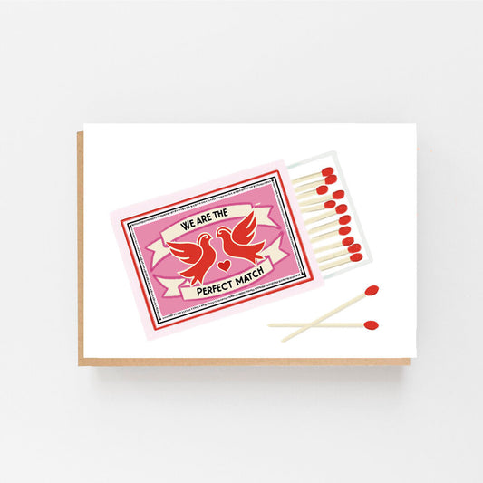 an open box of matches with the words we are the perfect match 