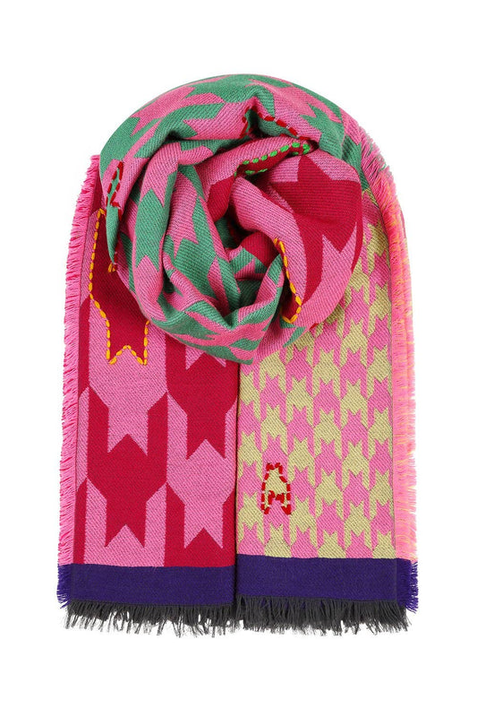 image of a scarf that has a multi pattern throughout out it in a variety of colours which are pink, red, yellow and grey. the edges of the scarf and navy blue