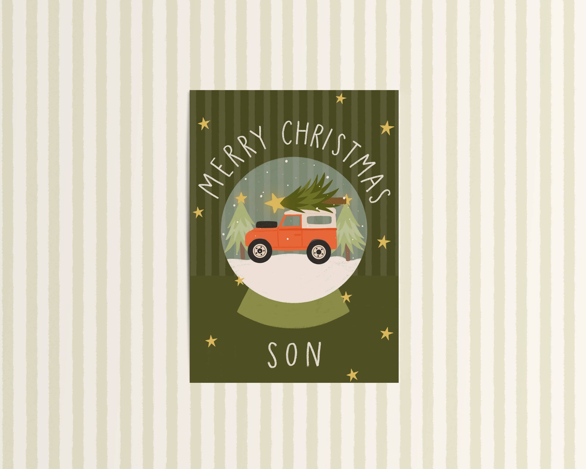 Christmas card with a red truck carrying a Christmas tree, text 'Merry Christmas Son' on a striped background.