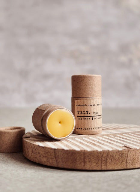 Mini lip balm Enriched with organic calendula extract. Vegan friendly packaged in a push up cardboard tube. Natural finished with applied.