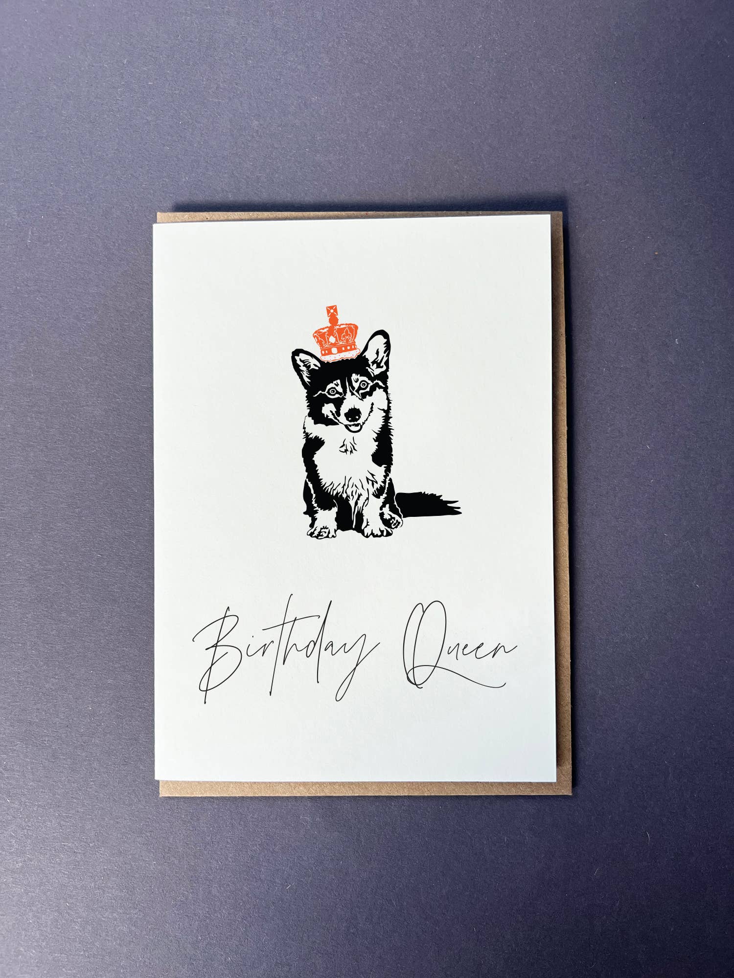 Greeting card with a dog illustration and 'Birthday Queen' text on a purple background