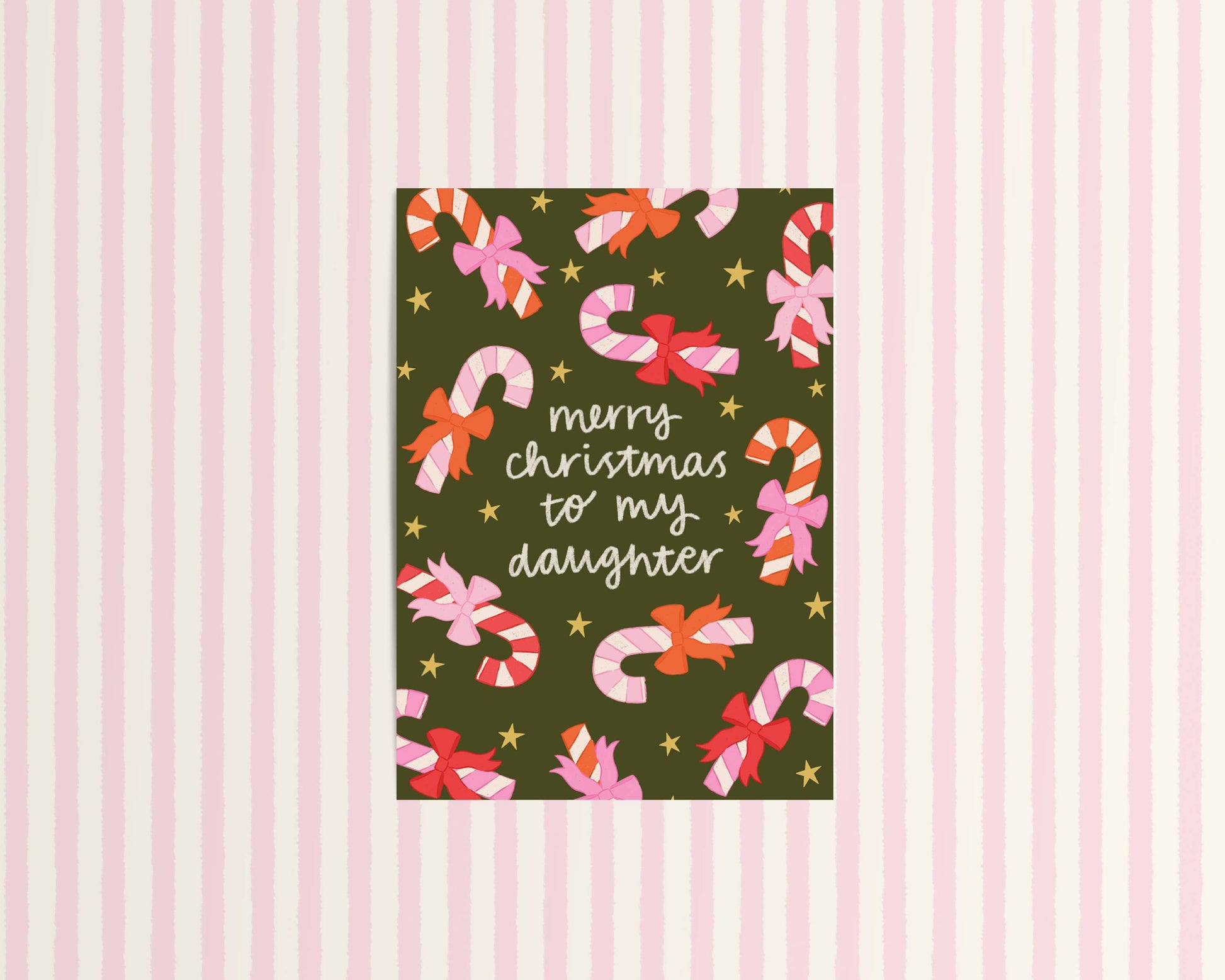Christmas card with candy canes and bows on a striped background