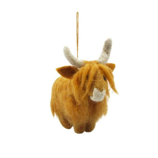 christmas tree hanging decoration of a brown highland cow.