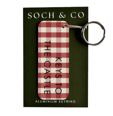Red and white checkered keyring with text on a green background, featuring the brand 'SOCH & CO'.