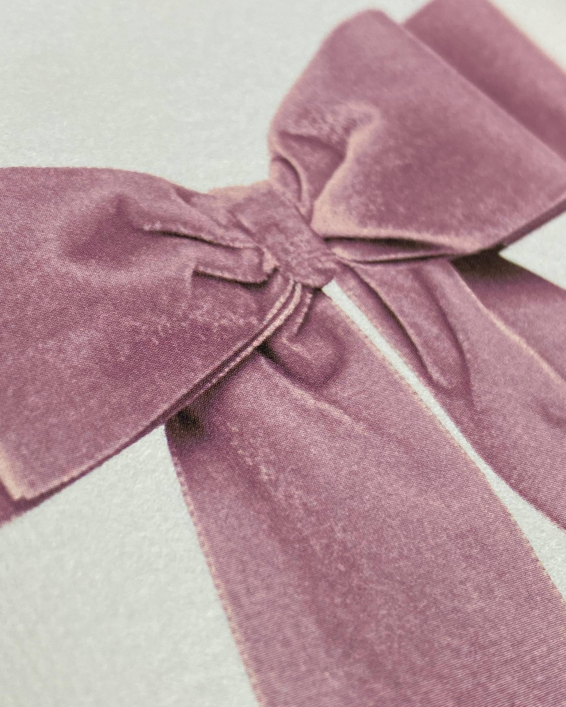 Greetings Card with a Pale Pink Velvet looking Ribbon looking bow on the front.  Looks like real material but it is an image  White Background.  White Envelope
