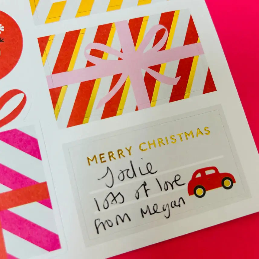 sticky christmas gift labels of various designs and colours