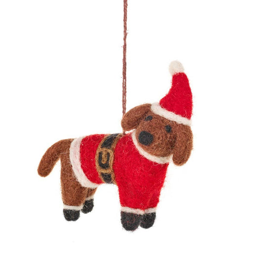 christmas tree hanging decoration of a brown sausage dog wearing a red christmas jacket and hat