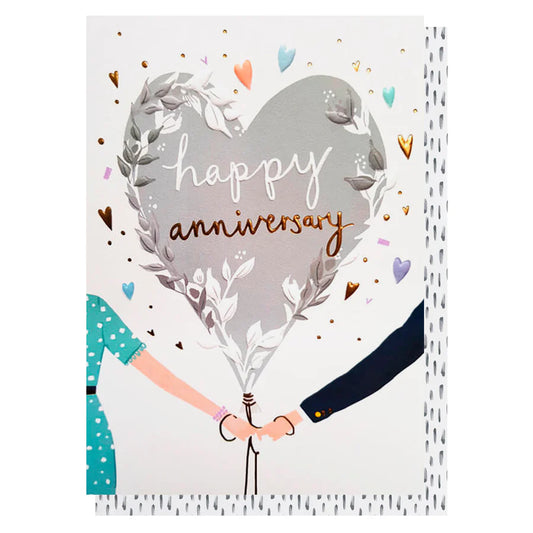 Greeting card with two hands holding a heart-shaped balloon with 'happy anniversary' text.