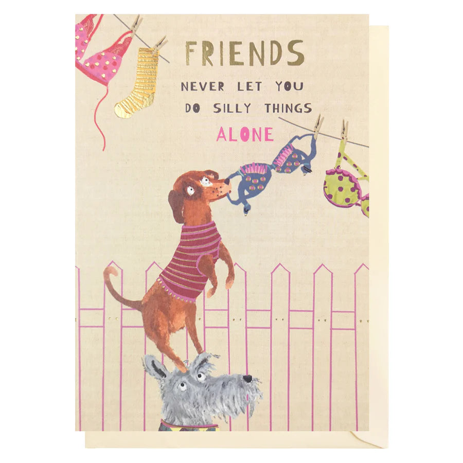 Card with illustration of two dogs and text 'Friends never let you do silly things alone' on a beige background.